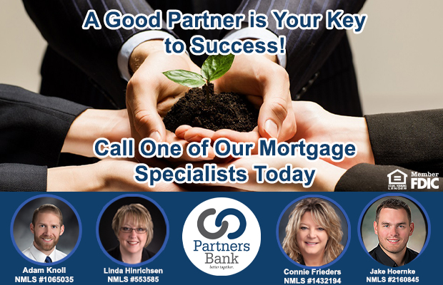 Advertising banner for a bank's mortgage specialists with four team headshots, a plant-in-soil image, and slogans: 'A Good Partner is Your Key to Success!' and 'Call One of Our Mortgage Specialists Today.'